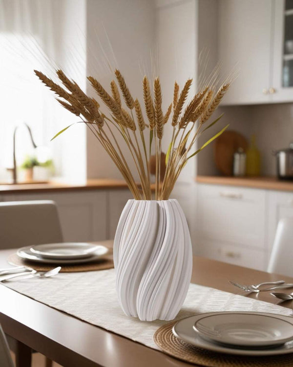 3D printed geometric vase with dried wheat on a dining table in a bright minimalist kitchen