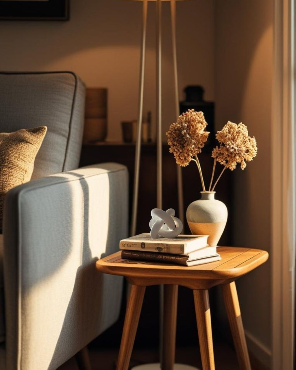 Wooden end table with decorative knot in a cozy living room setting