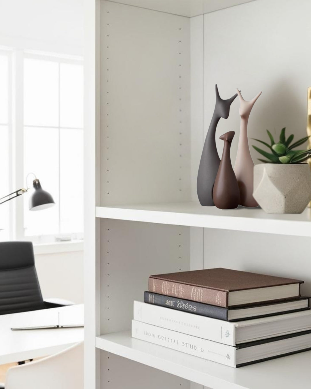 animal decor accents on shelf with books and plant in farmhouse home office