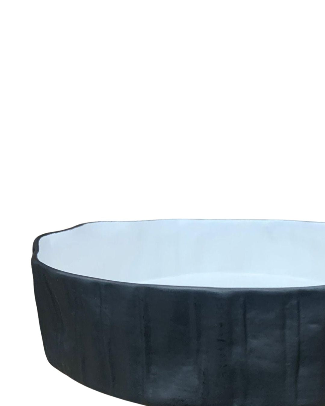 Black and white ceramic bowl on a white background