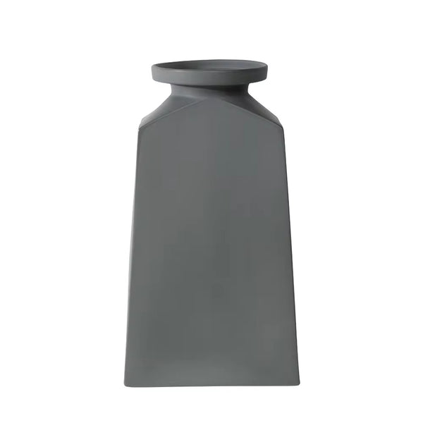 Bold geometric porcelain vase isolated on white background


