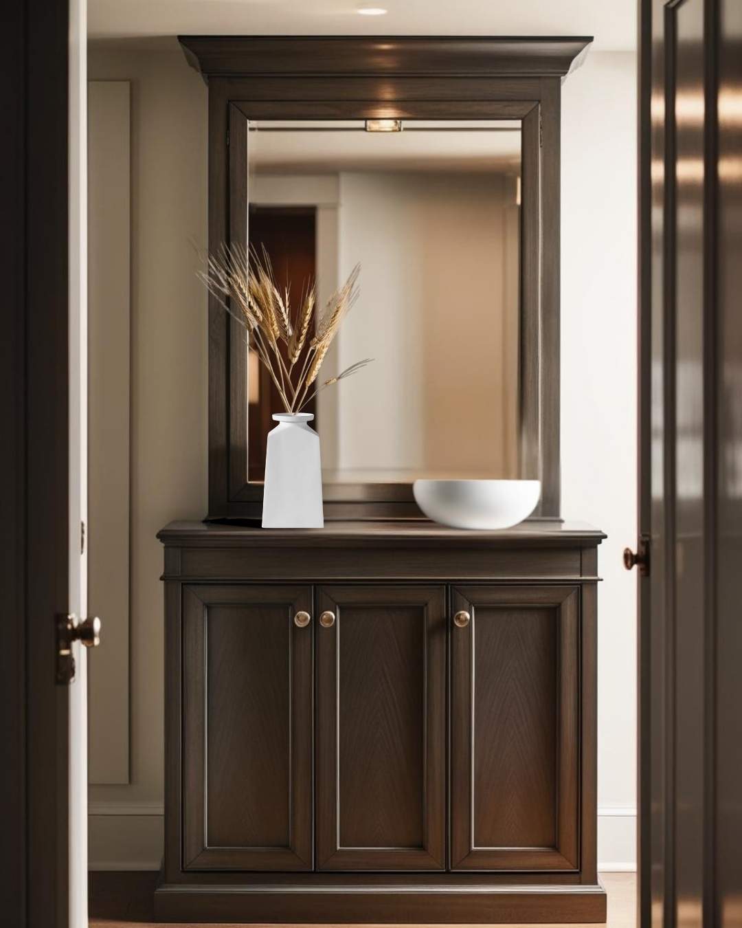 Bold geometric white porcelain vase on entry table in a farmhouse style entry

