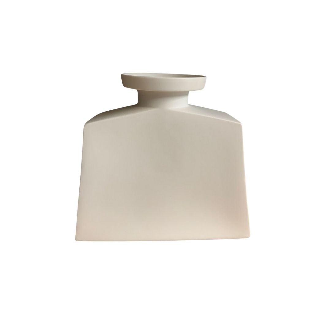 Bold geometric white porcelain small vase isolated on white background

