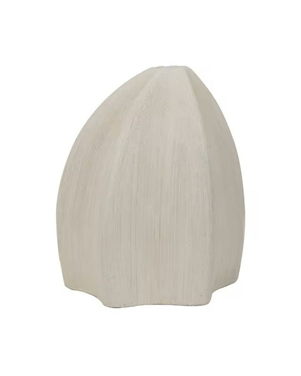 Bold sculptural geometric white vase on white background

