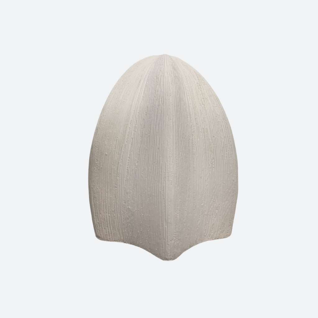Bold sculptural geometric white vase on whte background



