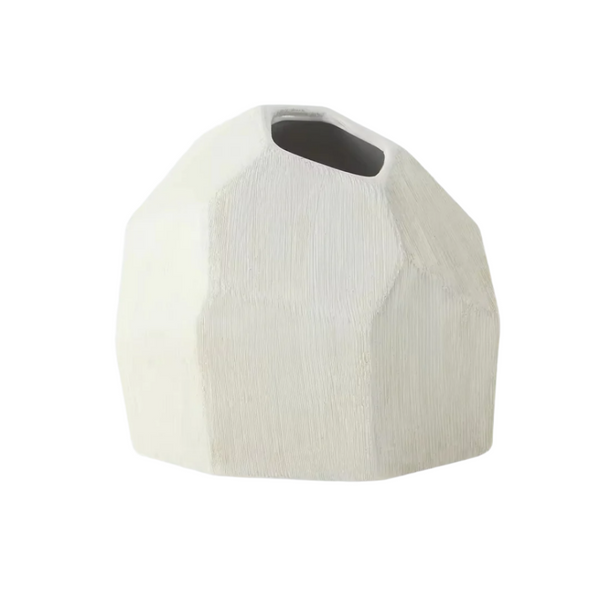 Bold white sculptural ceramic vase isolated on white background