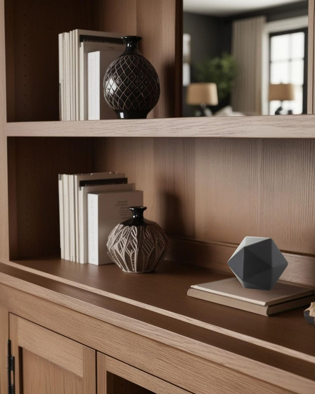 Geometric accent on light wood bookcase in a cozy farmhouse style living room