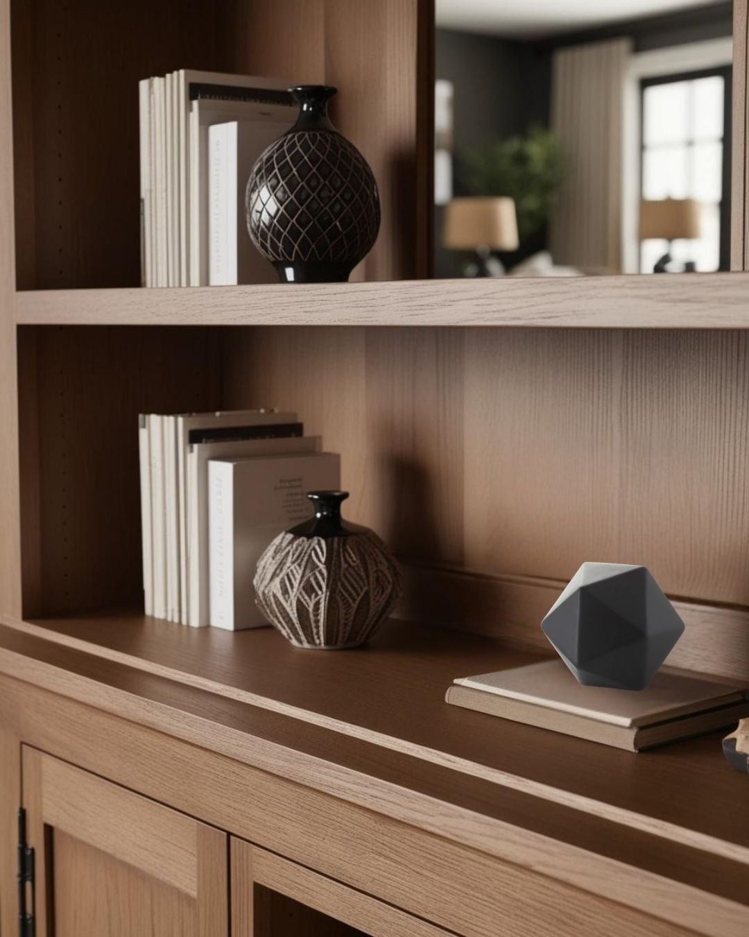 Geometric accent on light wood bookcase in a cozy farmhouse style living room