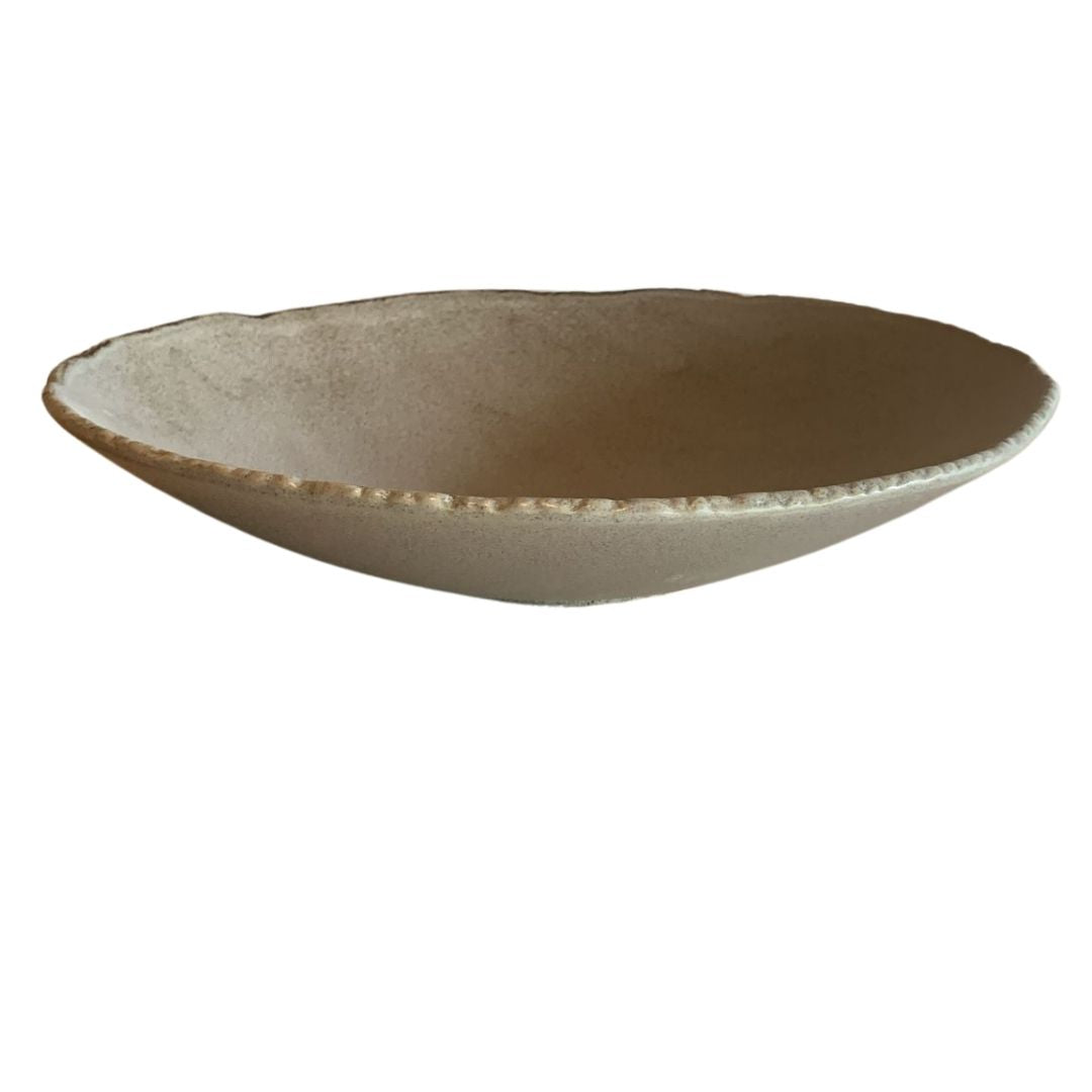 Handcrafted gray rustic porcelain bowl on plain white background