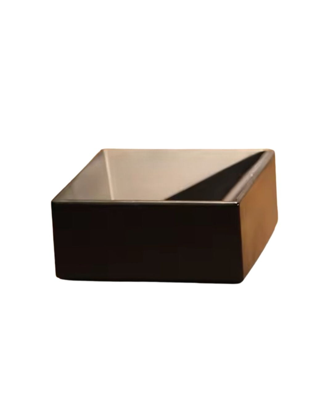 Premium black concrete valet tray catch-all on a wood desk in a rustic-modern home office with a laptop, pen holder, and potted plant