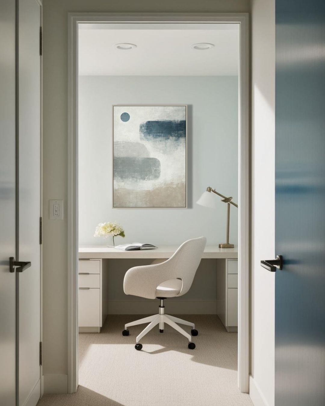Scandinavian style canvas hanging in bright neutral bathroom with contemporary details