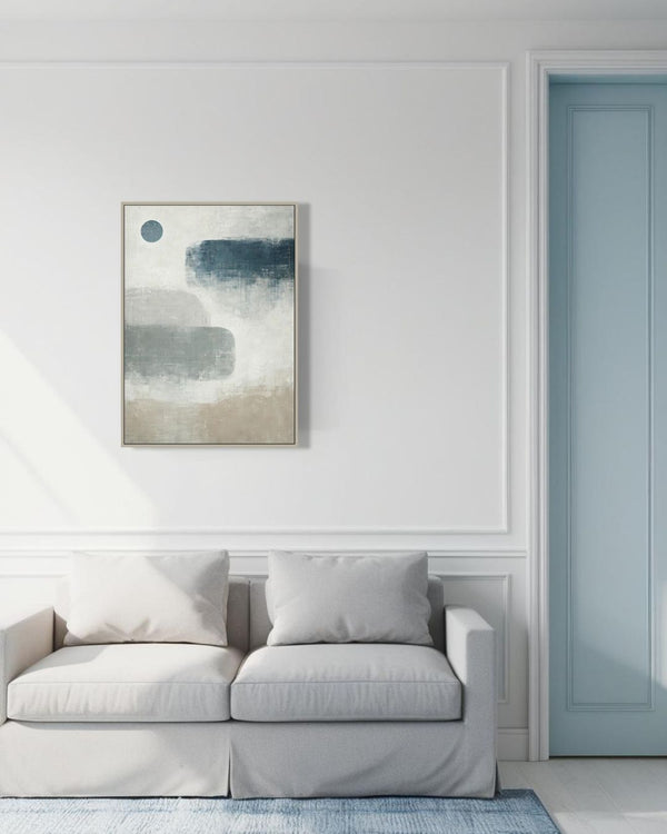 Scandinavian canvas wall art hanging above light gray sofa in bright minimalist living room