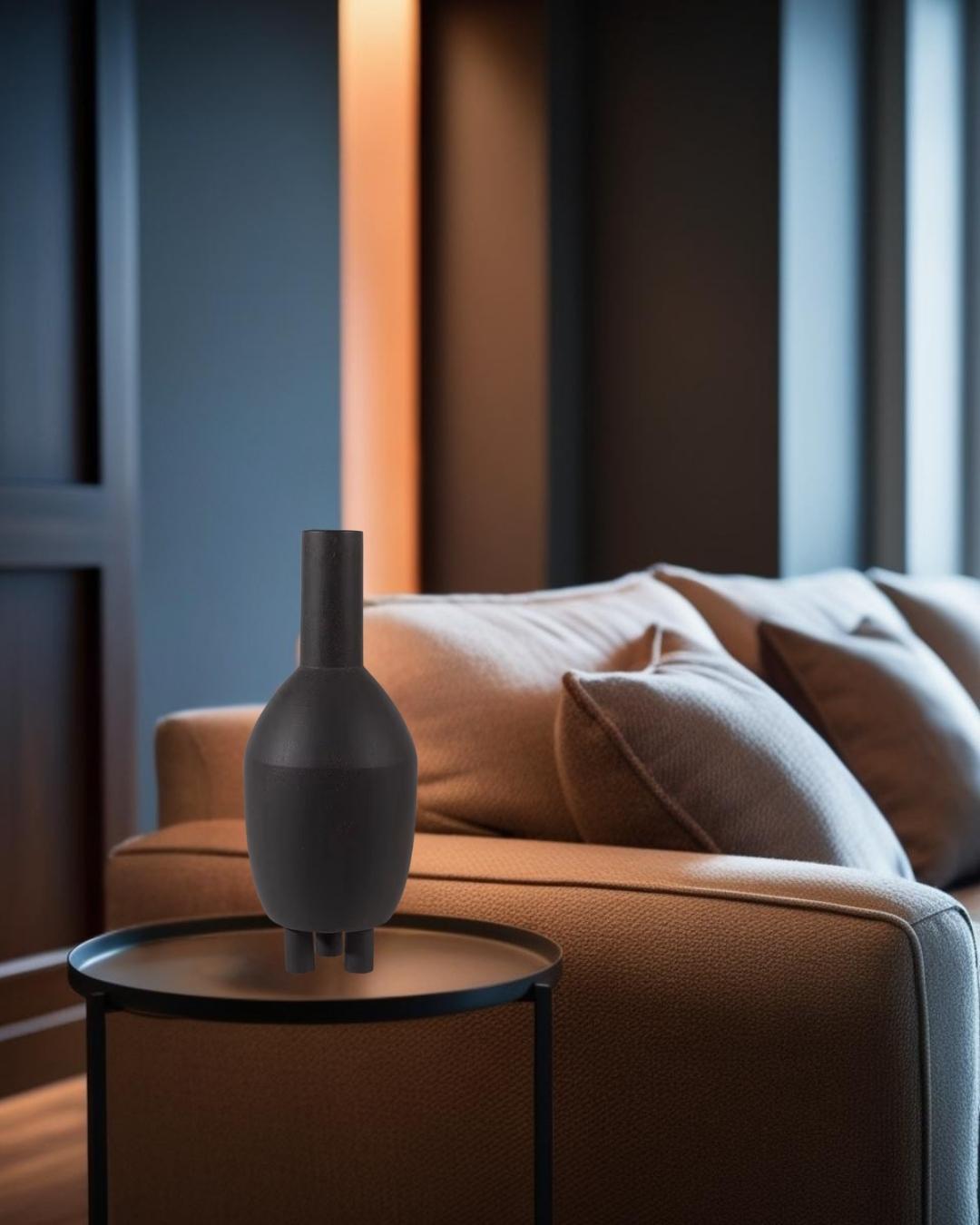 Tall sculptural ceramic vase in neutral tones on end table, Wabi-Sabi living room

