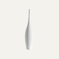 tall slim ceramic vase on white background