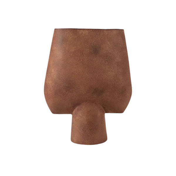 Wabi-Sabi terracotta ceramic vase on white background