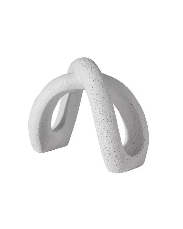 White ceramic decorative accent sculpture in arch shape, isolated on white background with speckled rustic finish
