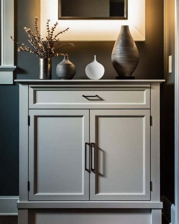 White ceramic vase on entry table in a compact farmhouse entry