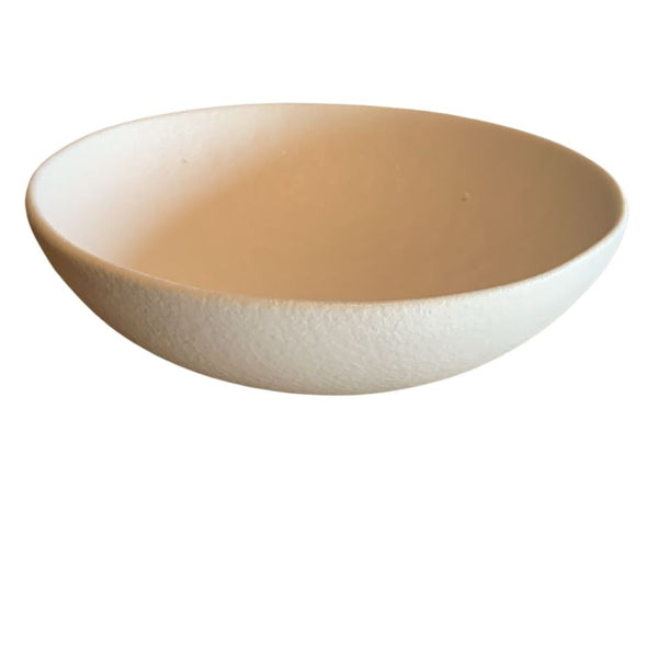 Side view of white shallow porcelain bowl isolated on white background

