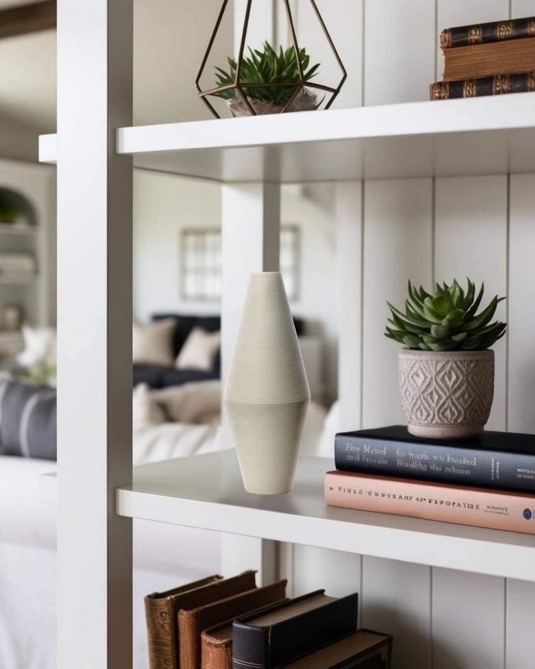 White vase and plants on shef in a compact farmhouse living room in a house

