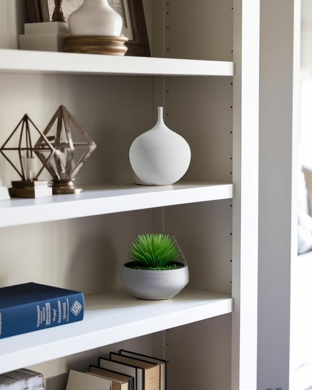 White vase on bookcase in a compact farmhouse living room

